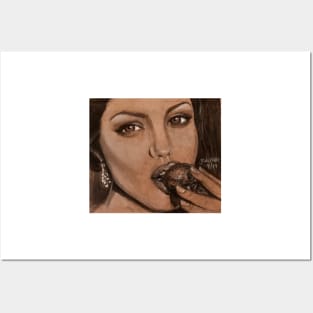 Angelina Jolie eating a strawberry. Posters and Art